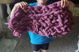Larning to crochet "I want to make blankets for babies or dogs at the shelter"