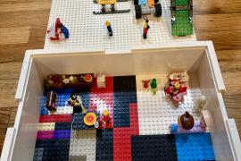 A Lego scene of minifigs playing outdoor games and sports