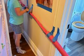 Marble run made from pool noodle. Marble drops into tube and then to floor. 