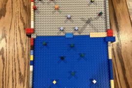 Coin drop carnival game made out of legos