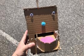 Monster bank made out of cardboard