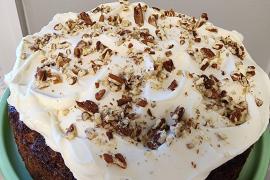 Carrot cake on green stand