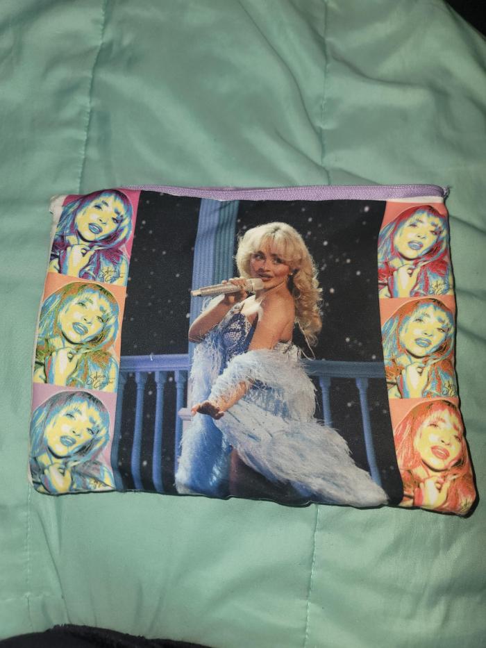 Sublimated Sabrina into this fabric and made it a bag with a zipper.