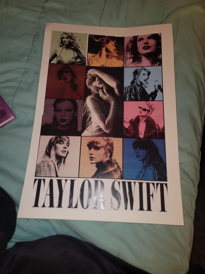 I made my own Taylor Swift poster. Thanks to Ms. Rosa for helping me! I love my poster