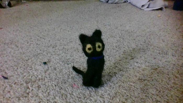 a needle felted black cat