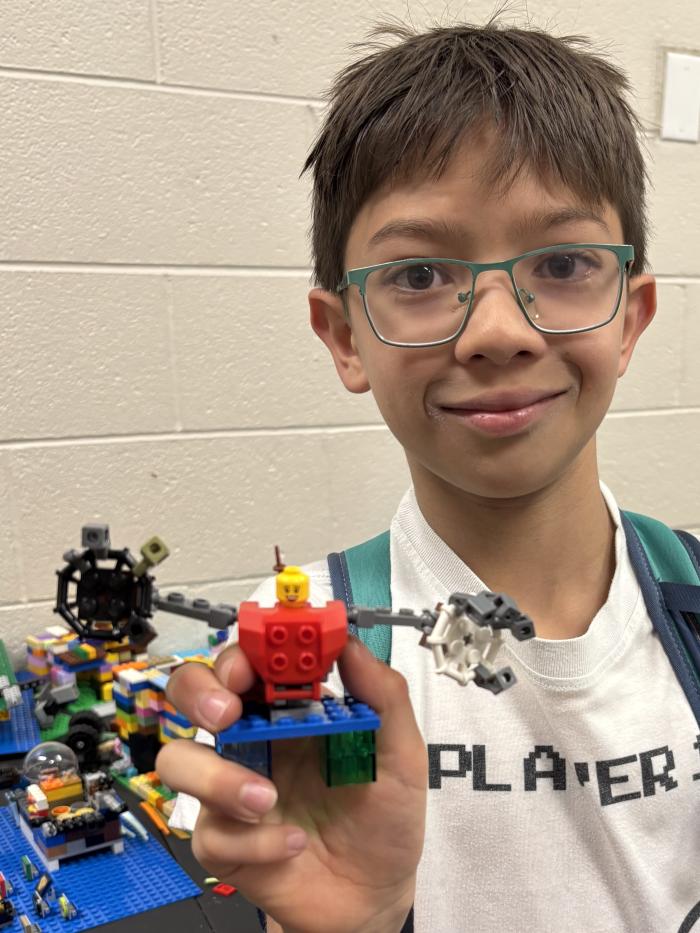 A Lego minifig in a mech suit