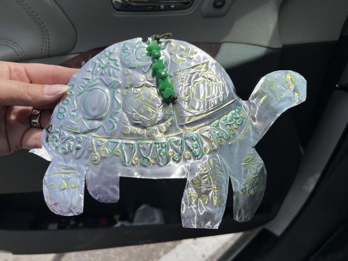 Tin turtle with marker and bead embellishment
