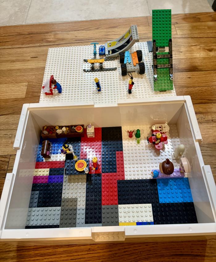 A Lego scene of minifigs playing outdoor games and sports