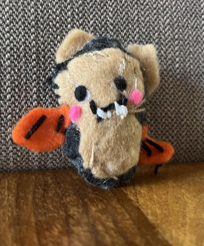 It is a small bat stuffy.