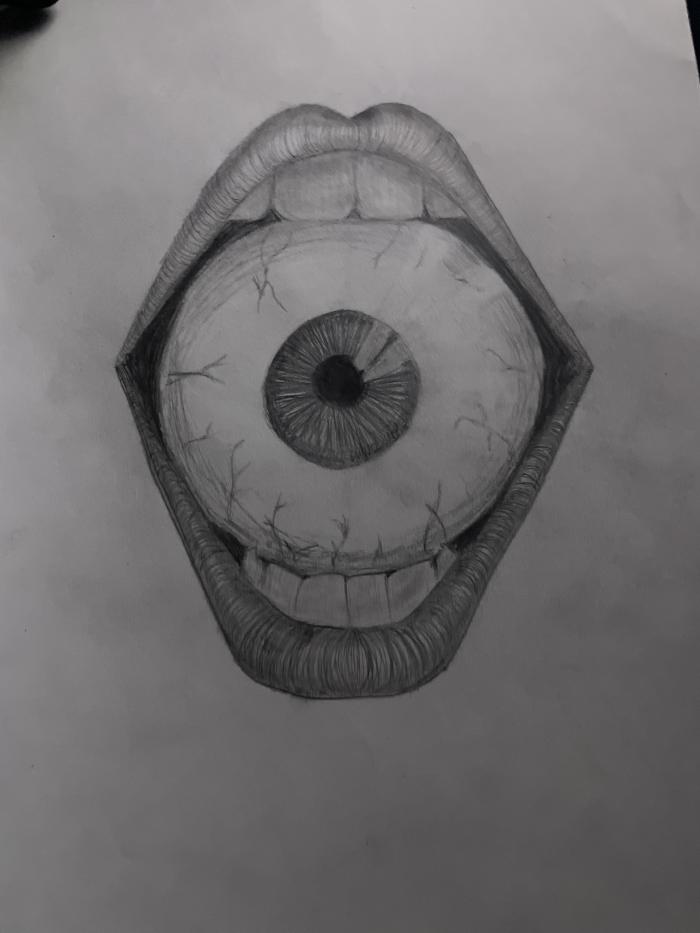 A eye inside of a open mouth.