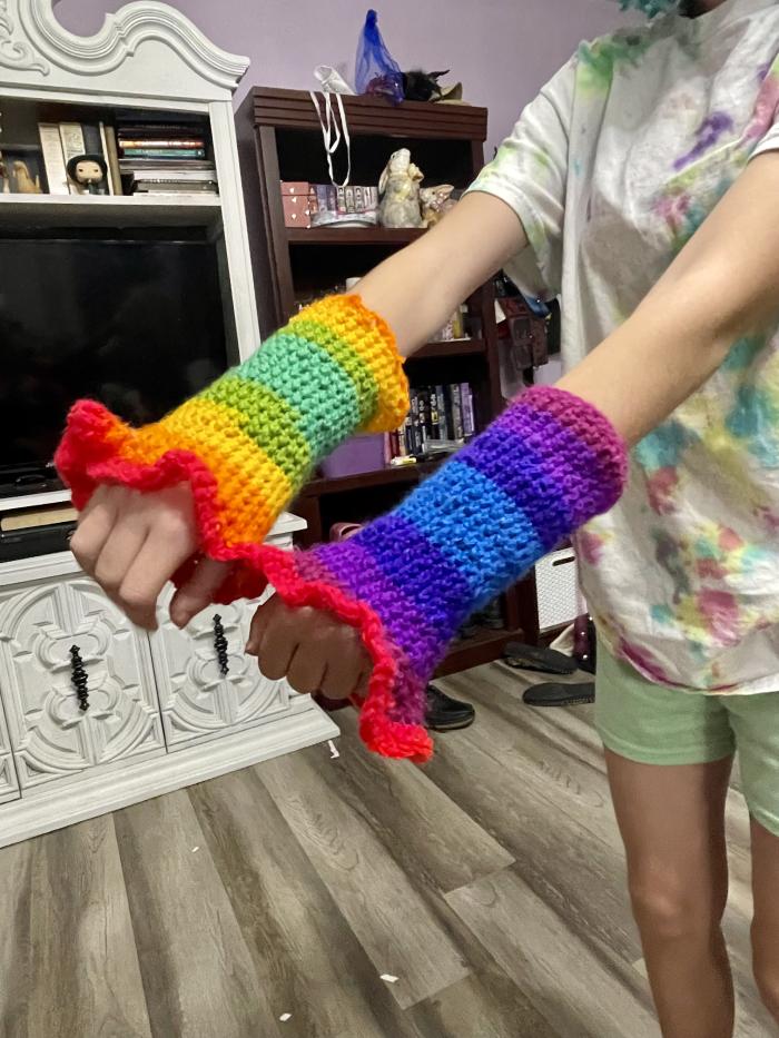 Arms with multicolored crochet arm socks