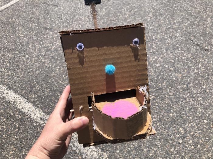 Monster bank made out of cardboard