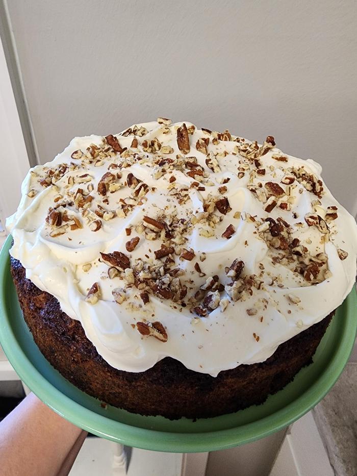 Carrot cake on green stand