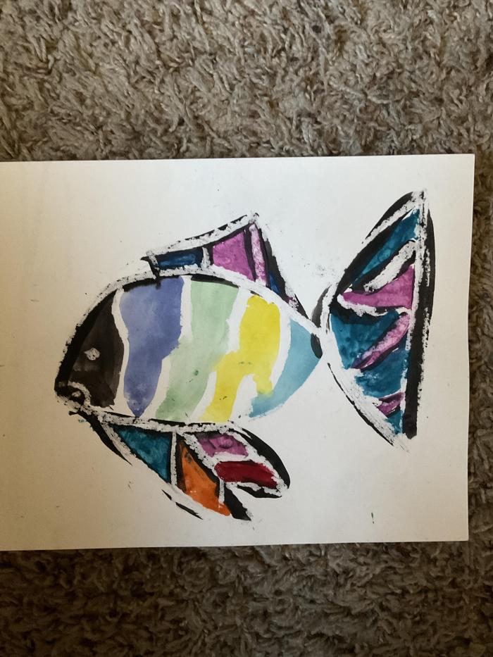 Using tape and watercolors and pastels to make a colorful fish