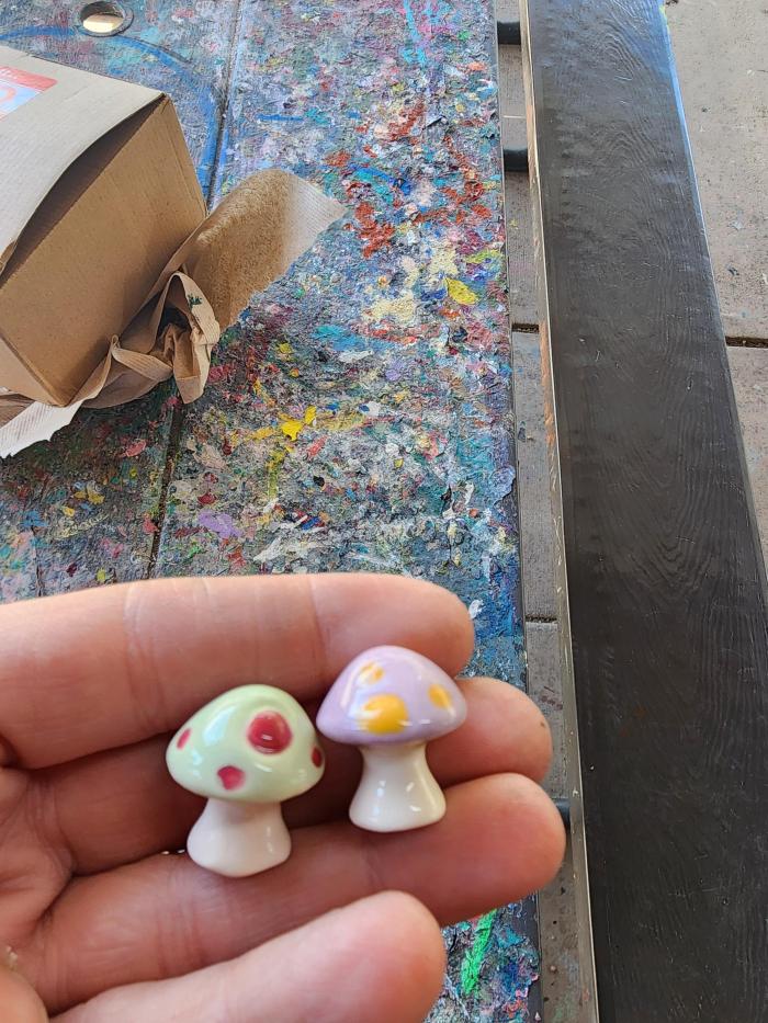 tiny glazed ceramic mushrooms